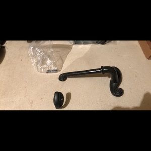 Toilet paper holder and a hook for the towel.